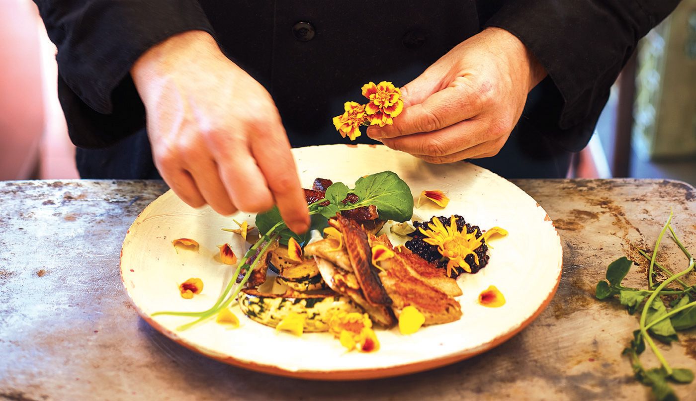 Sean Sherman preparing traditional food