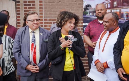 Woman interviews a man at AEDS event